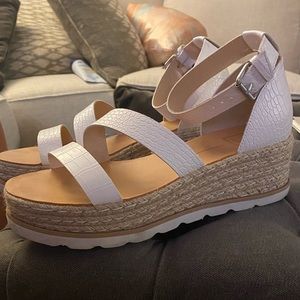 Dolce Vita white platforms size 10. Worn a few times, bought this season.